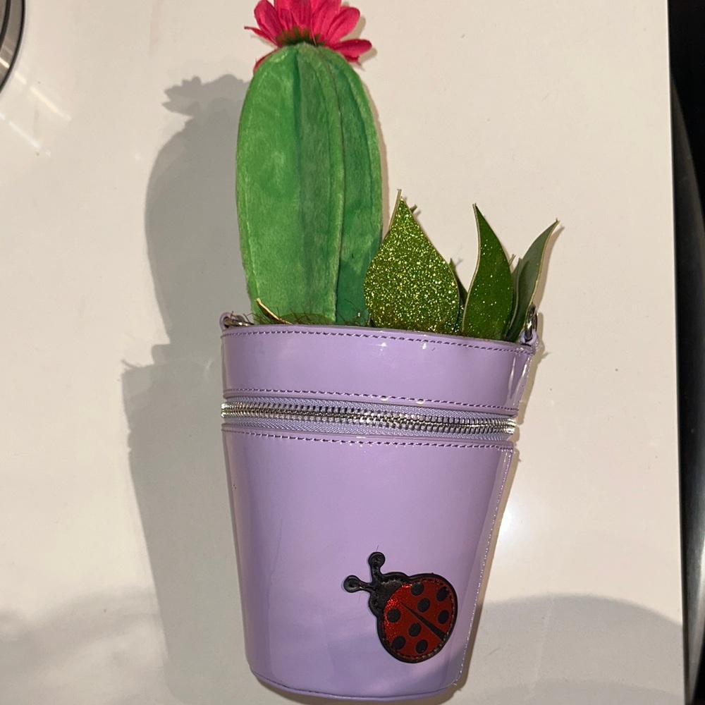 Delia’s Purple Pot with Green Cactus and Pink Flower - Picture 2 of 5